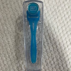 Rodan and Fields micro-dermabrasion roller and cleaning container